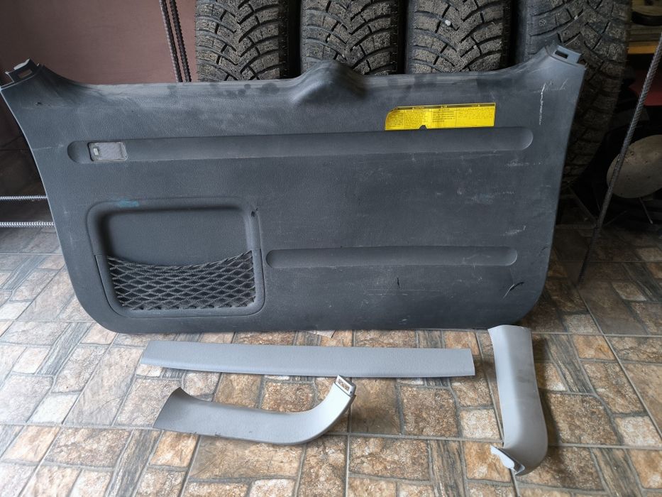 Обшивка пластмасова. Карта дверна. Замок.Задня ляда. Toyota RAV 4. 3 покоління.