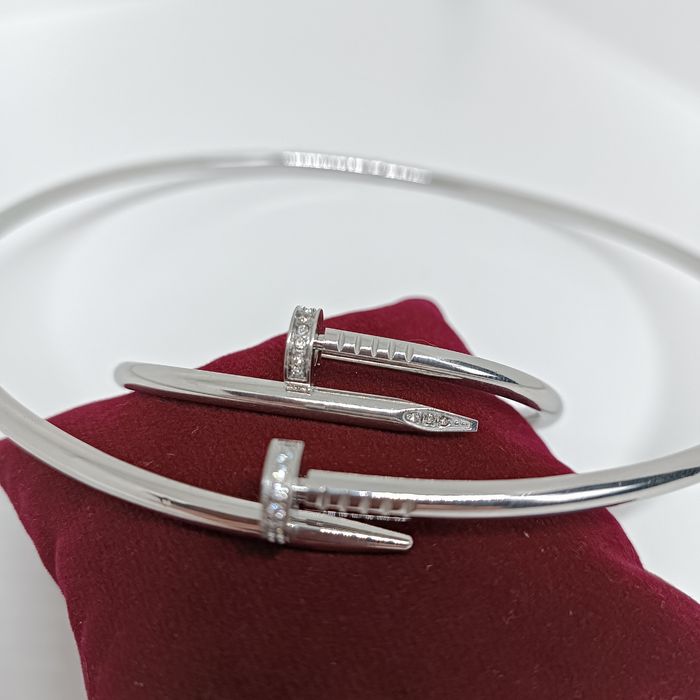 Набір прикрас жіночий: жорсткий чокер і браслет цвях  з цирконіями