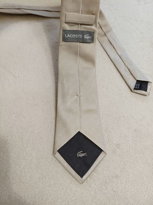 Lacoste оригінальна шовкова краватка бежевого кольору