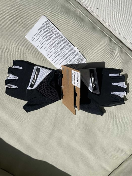 LUVAS BIKE / BTT SHIMANO PRETAS L - COM ETIQUETA - CURTAS/SEM DEDOS64283890942465123