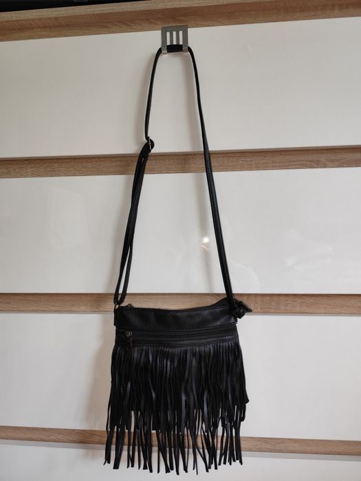 Mała listonoszka z frędzelkami