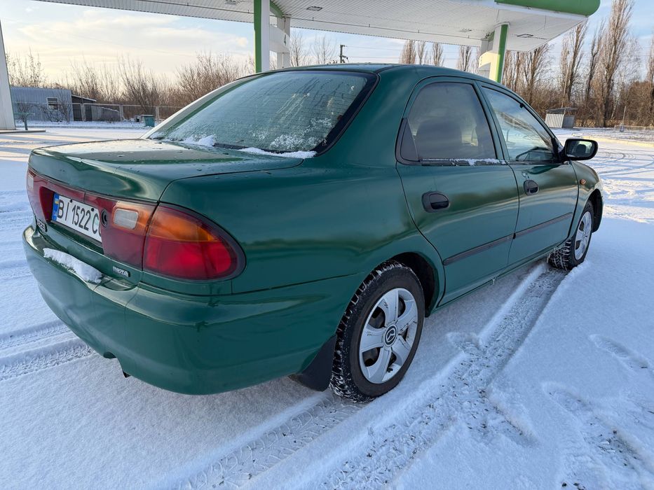Продам Mazda 323