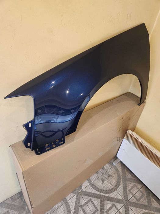 Passat B6 05-10 błotnik lewy LD5Q