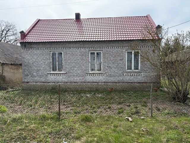 Dom z zabudowaniami gospodarczymi