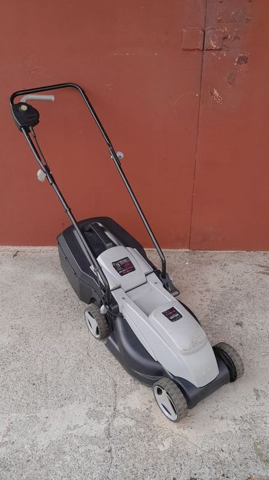 Продам  газонокосарку бу