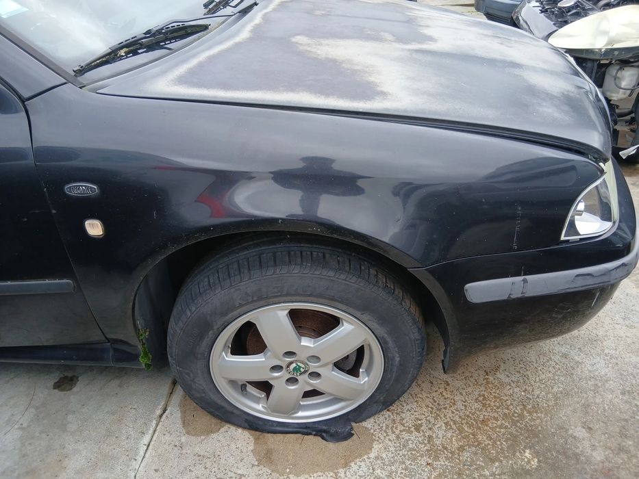 Guarda-lamas direito SKODA Octavia I Break (1U5)