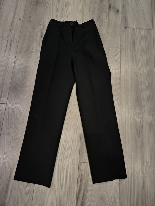 Materiałowe spodnie eleganckie dla chłopca rozmiar 140/146