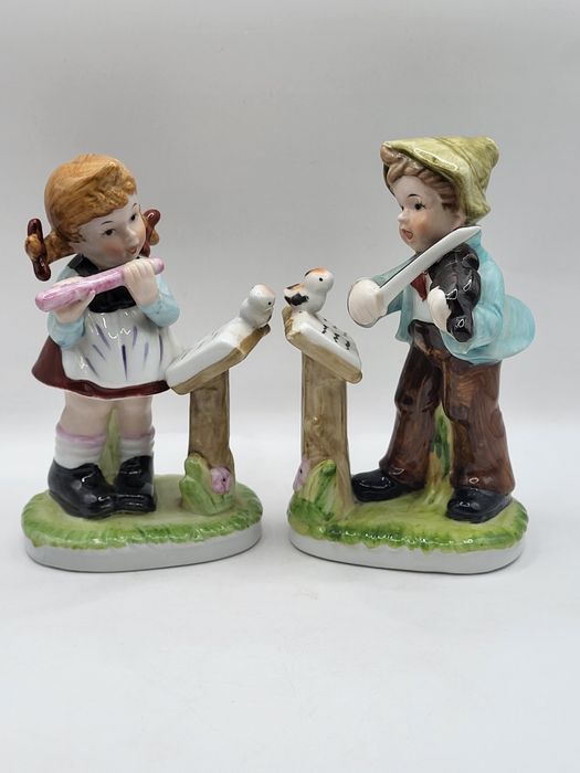 Porcelanowe figurki muzyków, 2 szt.