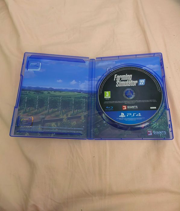 Jogo farming simulator 22 de ps4