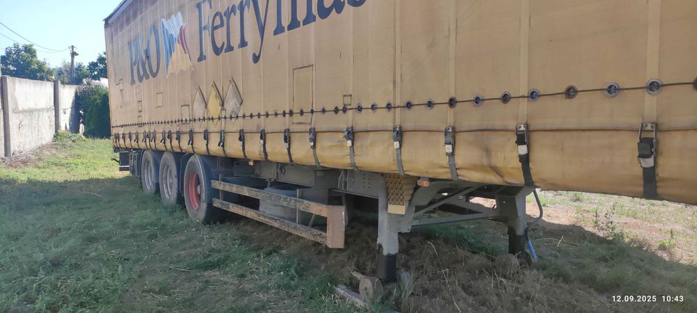 Продаж напівпричіп бортовий тентований, SCHMITZ S01