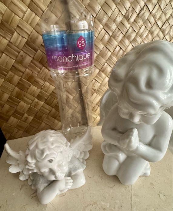 Par de anjos da guarda em porcelana