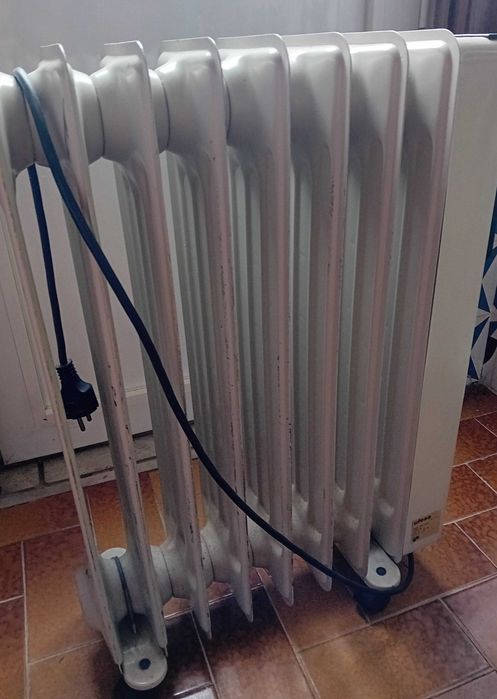 UFESA | Radiador óleo | 8 elementos | Termostato 8 | 2 fases