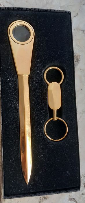 Conjunto com caixa de faca de papel com lupa e porta-chaves
