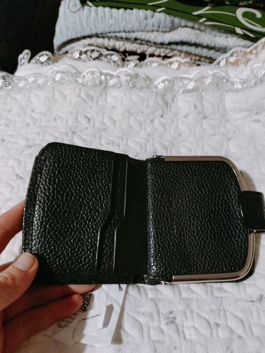 Гаманці та клатчі