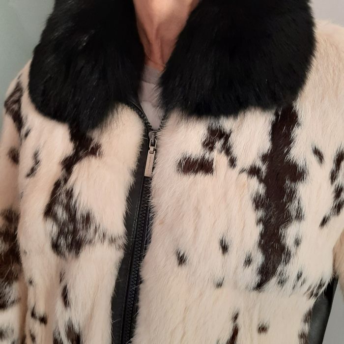 Venda de casaco de pelo natural e cabedal.