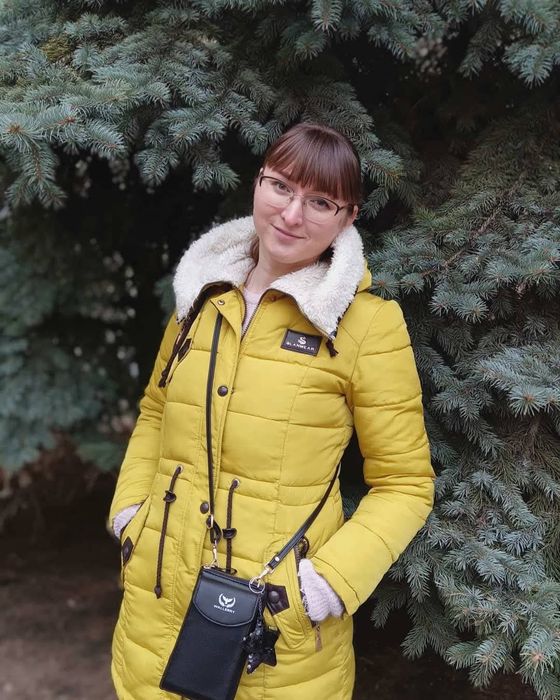 Отдам офигенную теплою парку