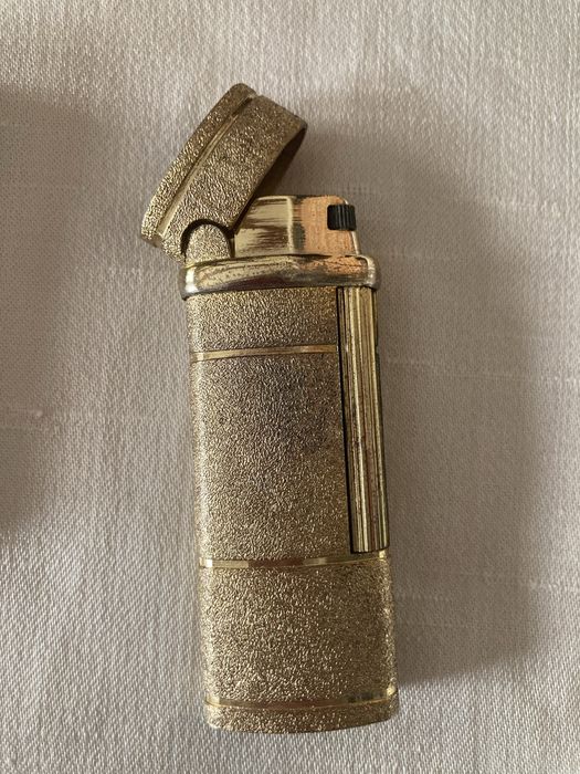Par de Isqueiros YSL -Yves Saint Laurent- dourado e prateado