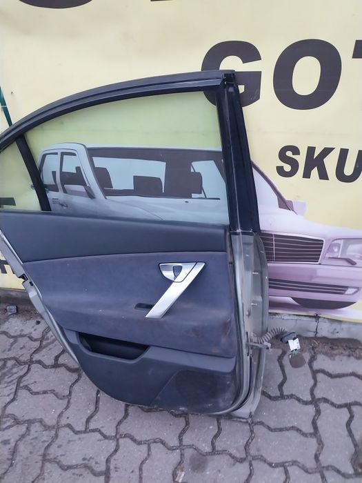 Nissan Primera p12 K30G HB drzwi lewy tył tylne lewe kompletne