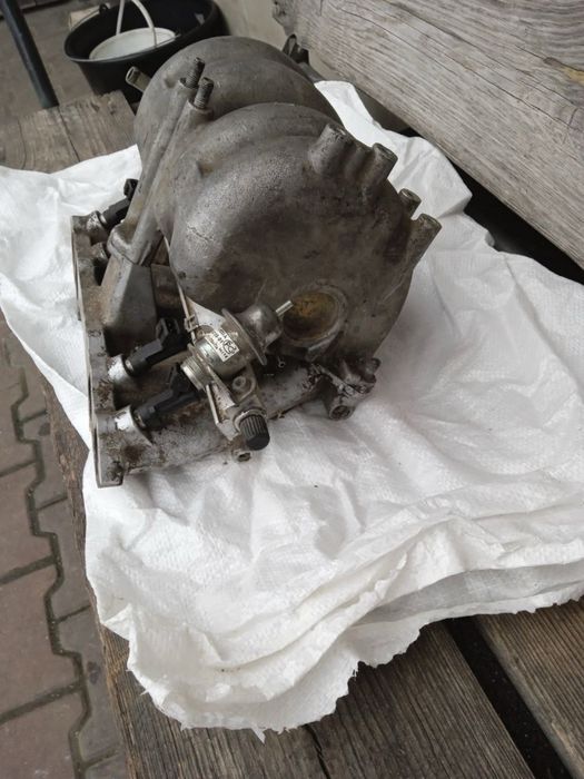 Колектор впускний ваз 2123 2107 2104