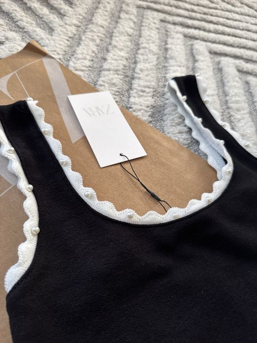 Swetry topy spodnie Zara