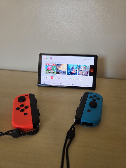 Nintendo Switch OLED + Jogo The Legend of Zelda Breath of the Wild