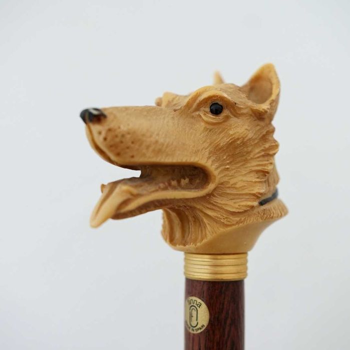 Bengala com cabeça de cão pastor esculpida