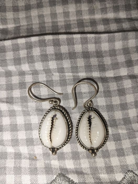 Brincos de búzio em prata