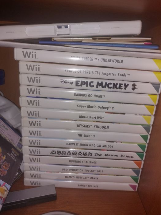 Wii em preto com imensos acessórios e jogos