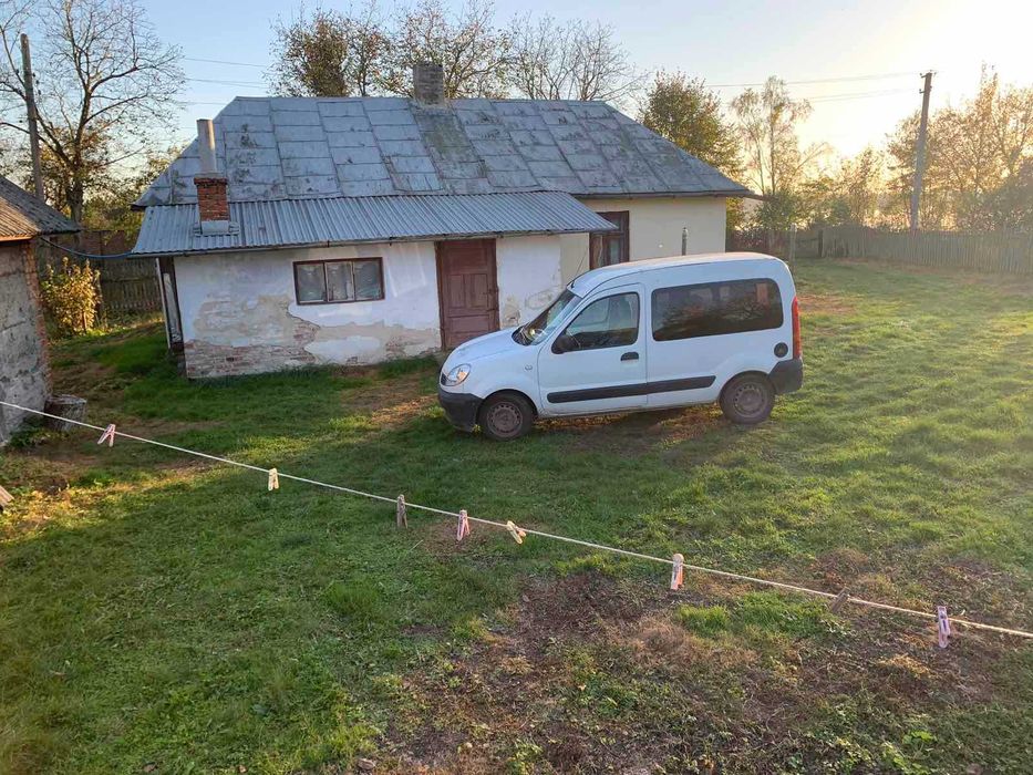 житловий будинок та земельна ділянка 46,5 сот