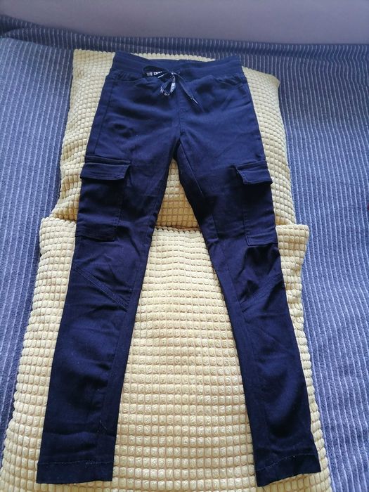 Spodnie legginsy dziewczęce czarne typu bojówki rozm 134