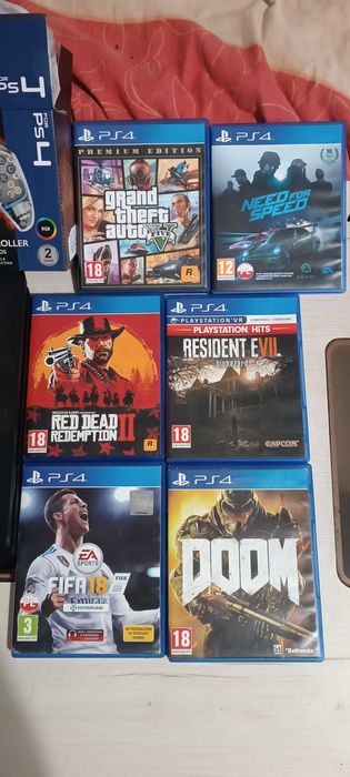Sprzedam konsole ps 4 dwa pady i gry