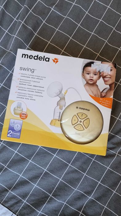 Молоковідсмоктувач medela swing, повний комплект із запчастинами та нові пакети для молока Philips Avent 180ml x25