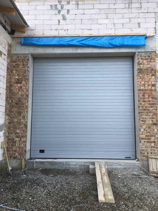 Секційні автоматичні ворота / ролети