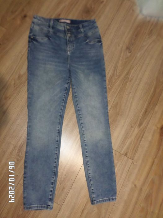Firmowe spodnie damskie -jeans-elastyczny-33/32-M