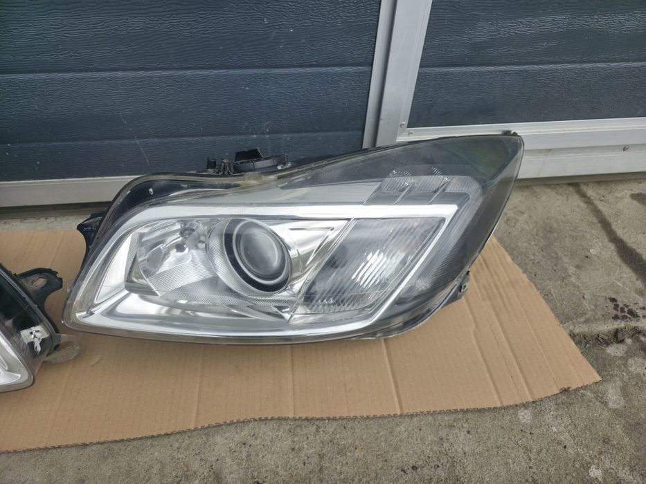 Opel Insignia A lampa lewa przód Bi Xenon