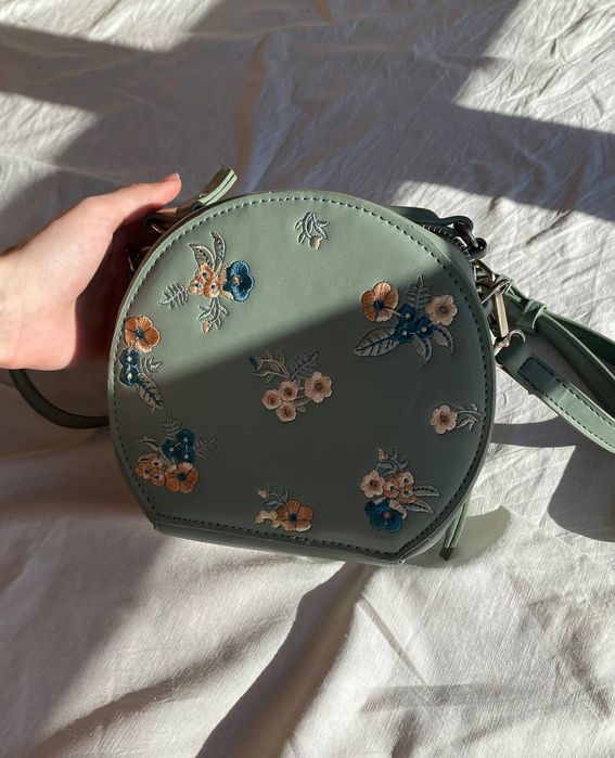 Кругла сумка-клатч