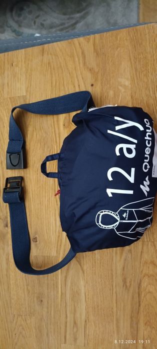 Kurtka przeciwdeszczowa Quechua dla 12 latka.