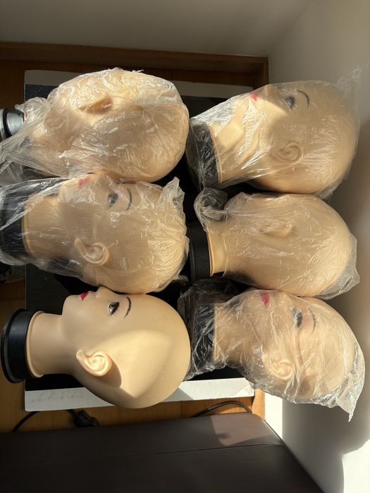 Cabeças de manequim feminino