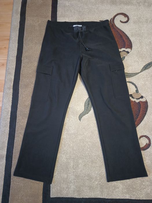 Spodnie elastyczne z kieszeniami po bokach B.B r. XXL
