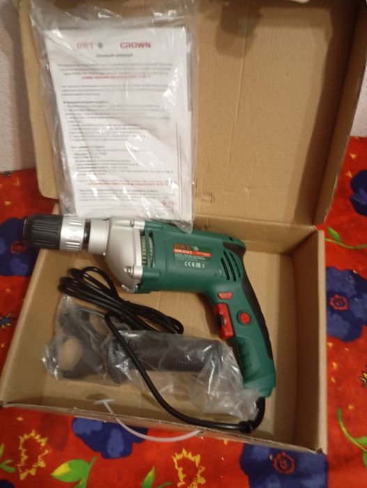 Продается новая в упаковке ударная Эл дрель DWT