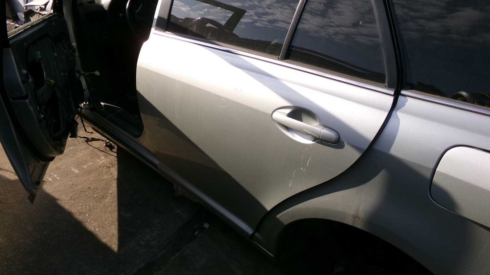 Paz55 Drzwi lewe tylne toyota avensis t25 kombi 1C0 wysyłka