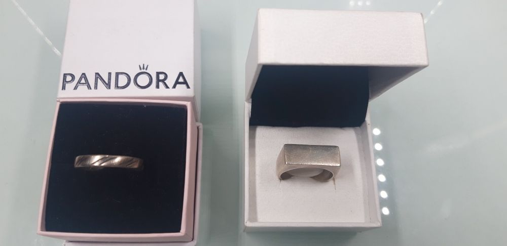 2 aneis de prata 925 ler discrição.