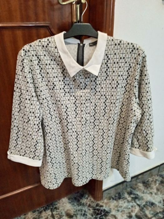 Roupa TAM XL em bom estado
