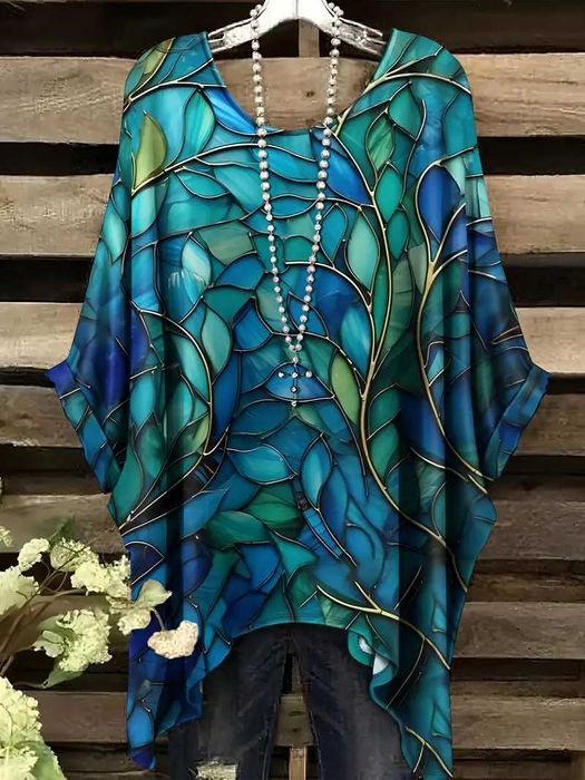 Bluzka z rękawem nietoperz w niebiesko-zielone liście śliczna r 50/52