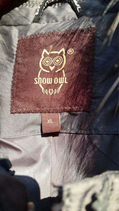 Жіночий зимовий пуховик