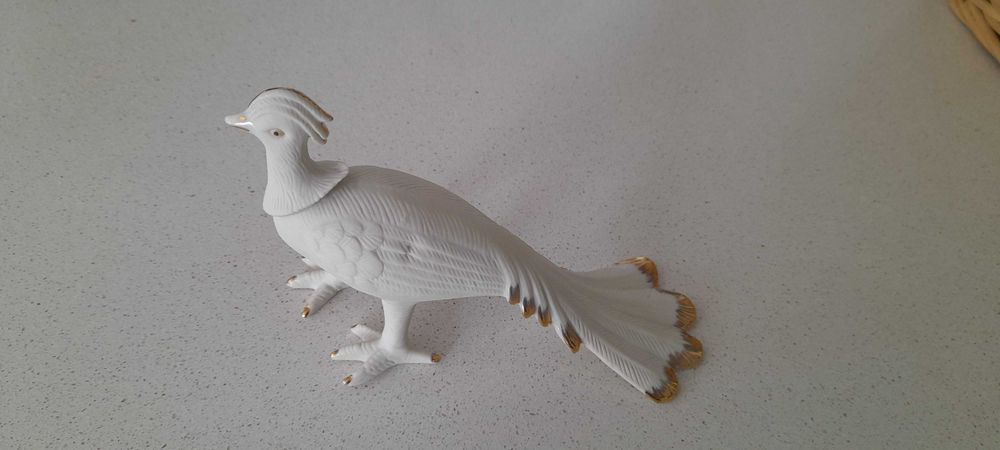 Pássaro em biscuit