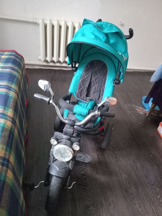 Продам отличный детский трехколесный велосипед-коляску Baby Tilly Tornado в красивом бирюзовом цвете.