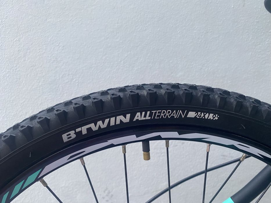 Bicicleta rockrider preta e azul turquesa roda 24