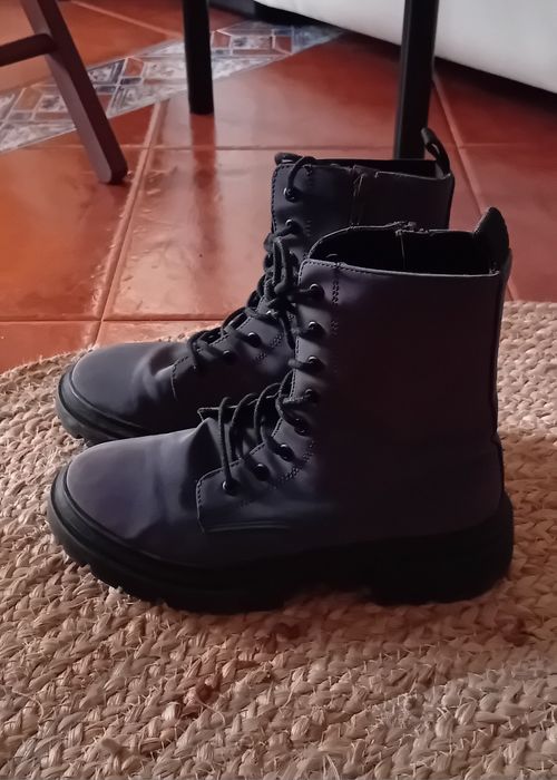 Boots with purple highlights