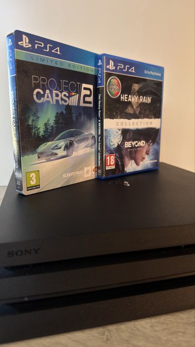 Sony playstation 4 pro e conjunto de 4 jogos